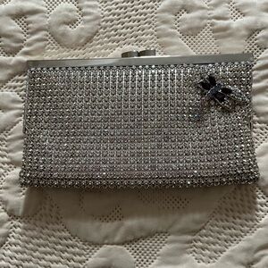 Elegant Silver Clutch with Crystal Embellishments